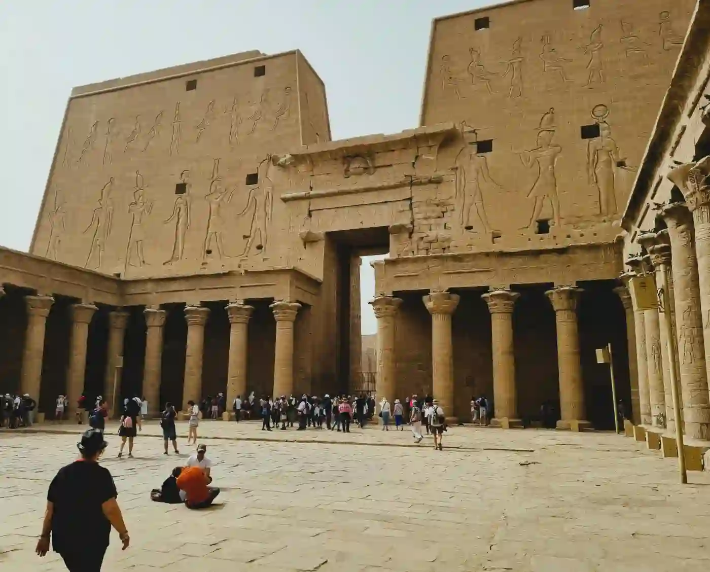 Visitors-exploring-the-ancient-Temple-of-Horus-in-Edfu