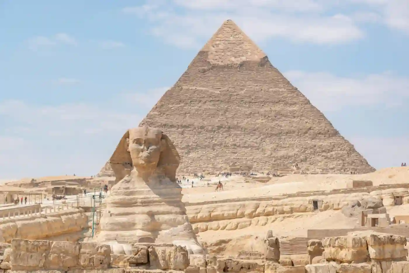 Iconic-Great-Sphinx-and-Pyramid-of-Khafre-under-a-bright-daytime-sky-in-Giz-Egypt.
