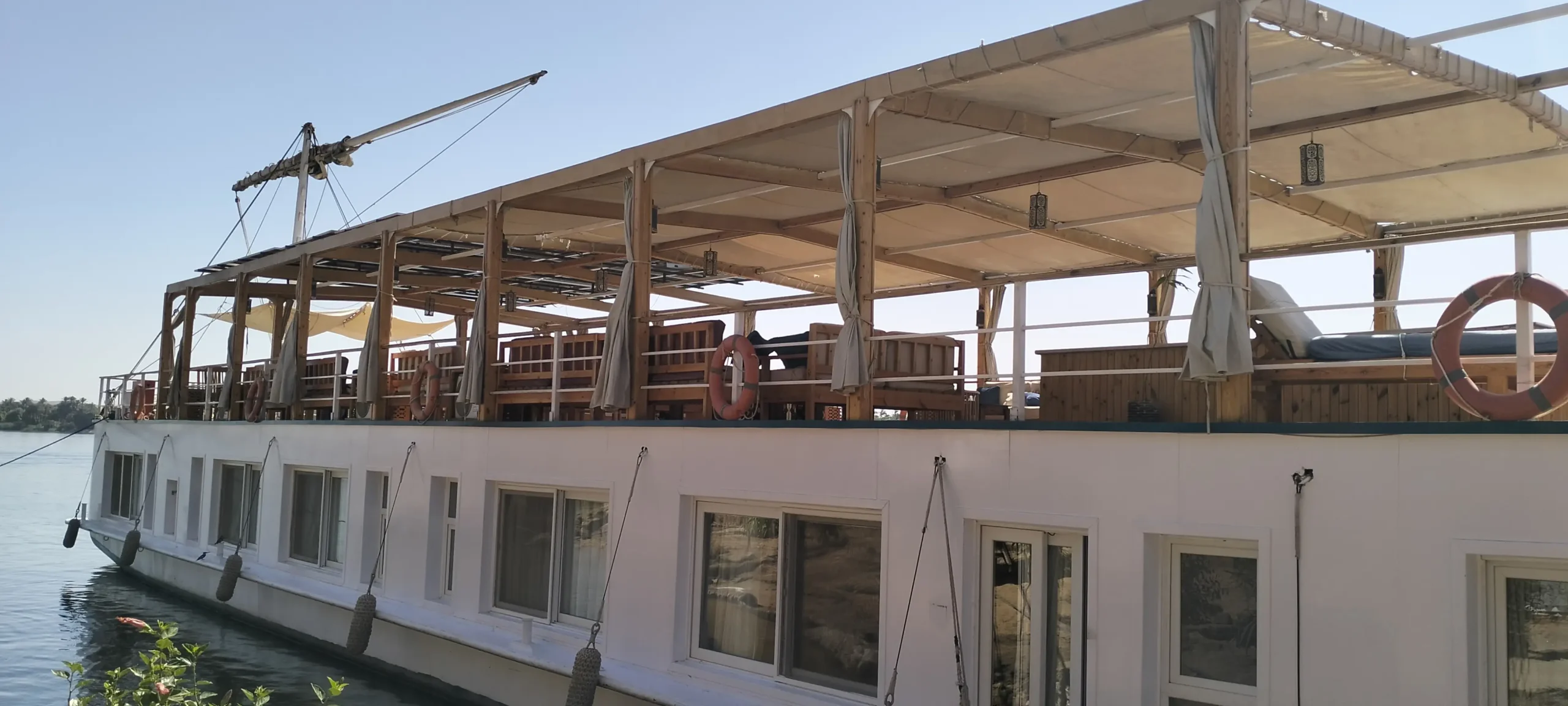 Solar Eclipse 2027 Cruise: Eight Days on the Nile, Six Minutes in the Dark A traditional sailing boat on the Nile at Luxor